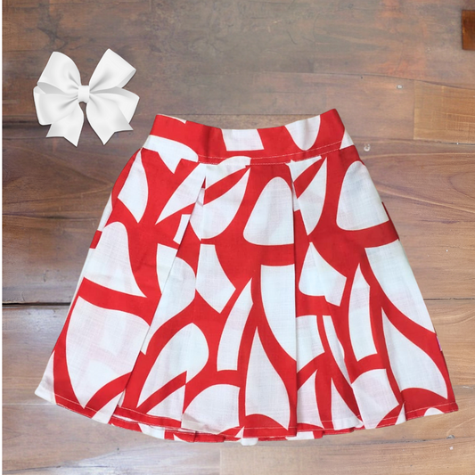 Box pleat skirt with matching hair accessory