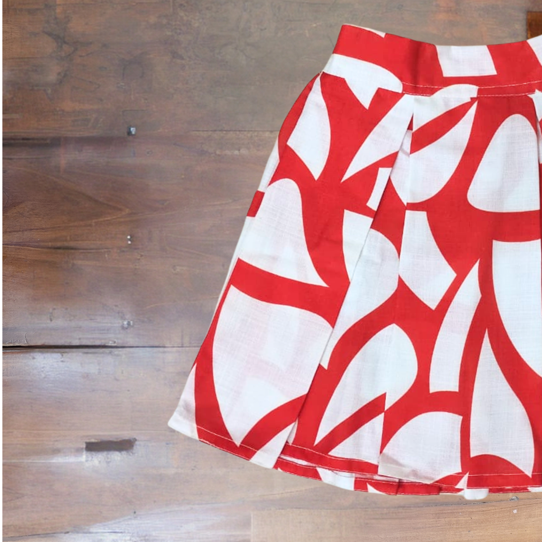 Box pleat skirt with matching hair accessory